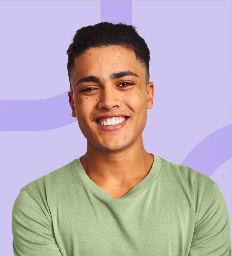 Teenage boy with acne smiling to camera